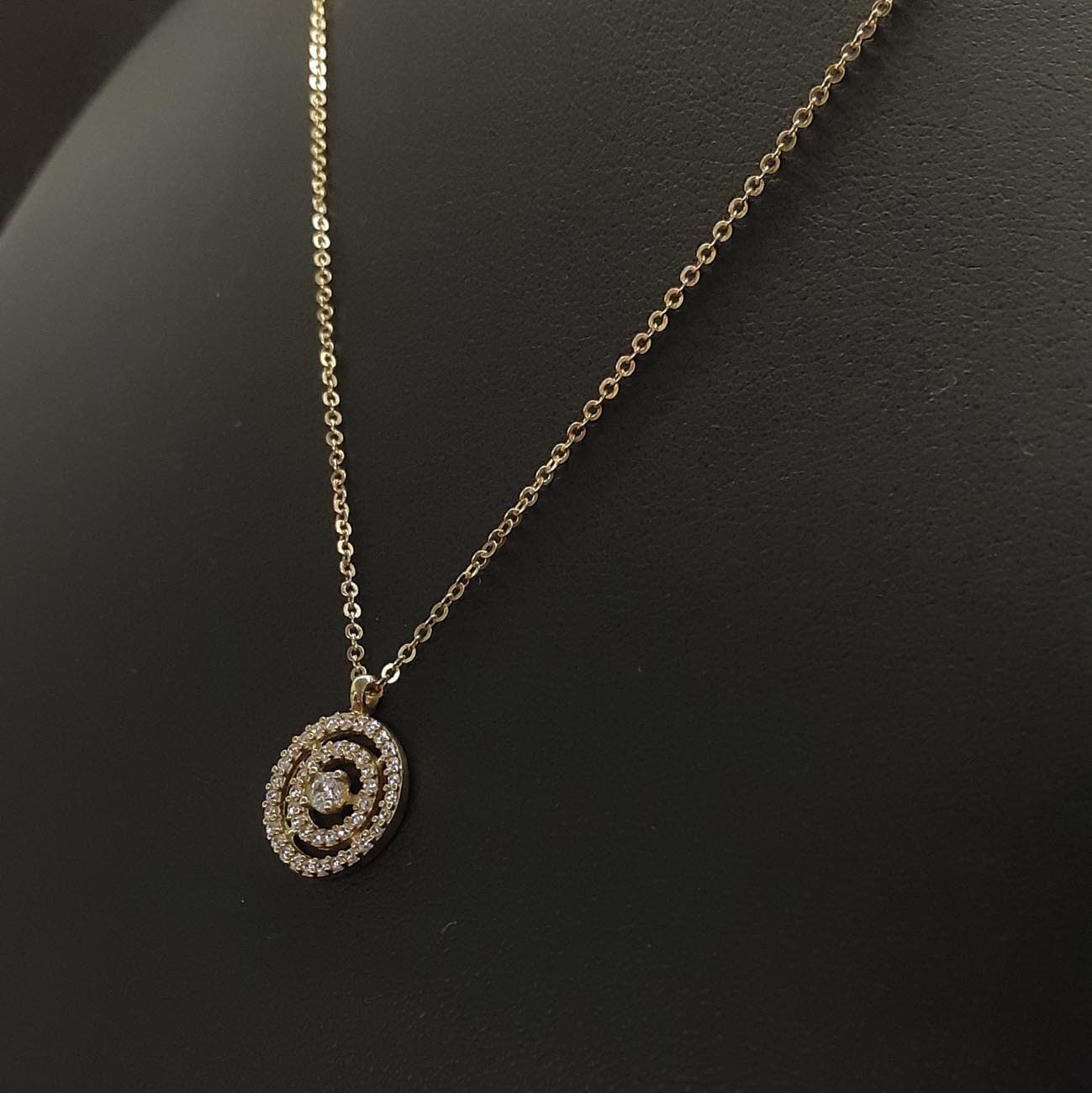 Χρυσό κολιέ ομόκεντροι κύκλοι ζιργκόν