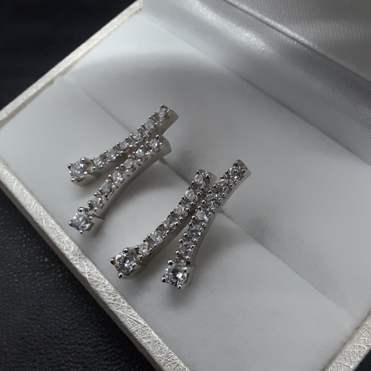 Σκουλαρίκια λευκόχρυσα Κ14 ζιργκόν