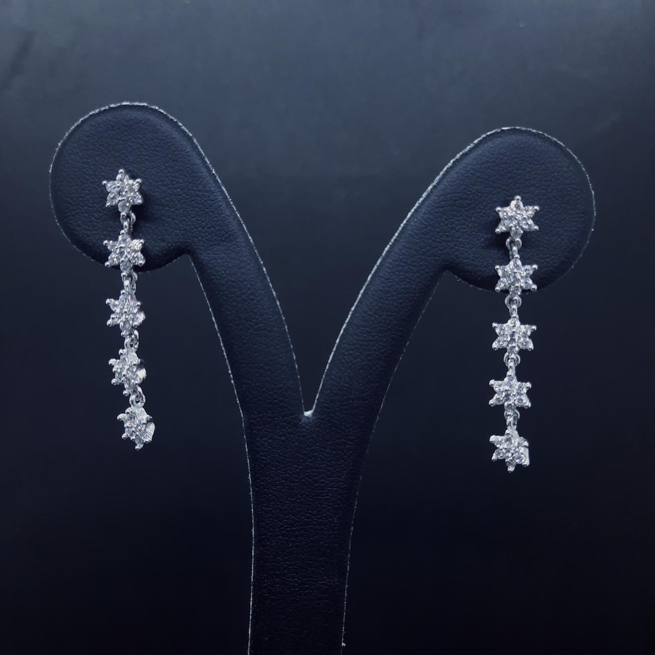 Σκουλαρίκια λευκόχρυσα ζιργκόν