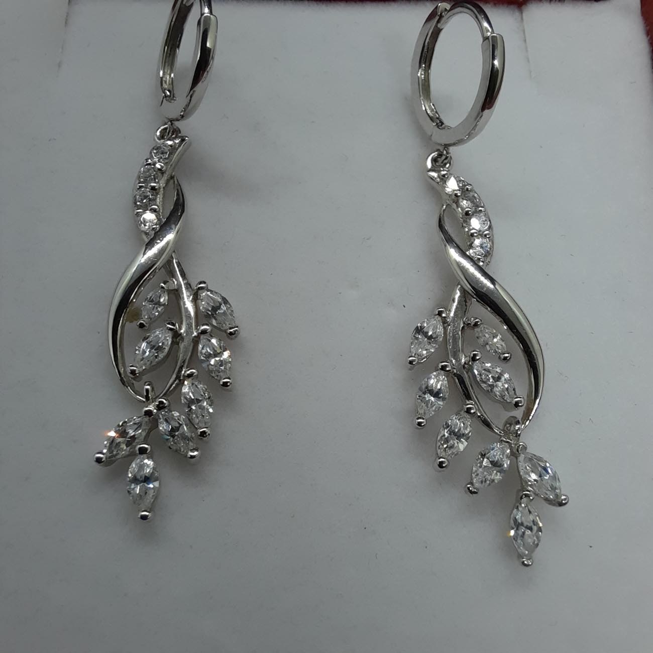 Σκουλαρίκια λευκόχρυσα ζιργκόν