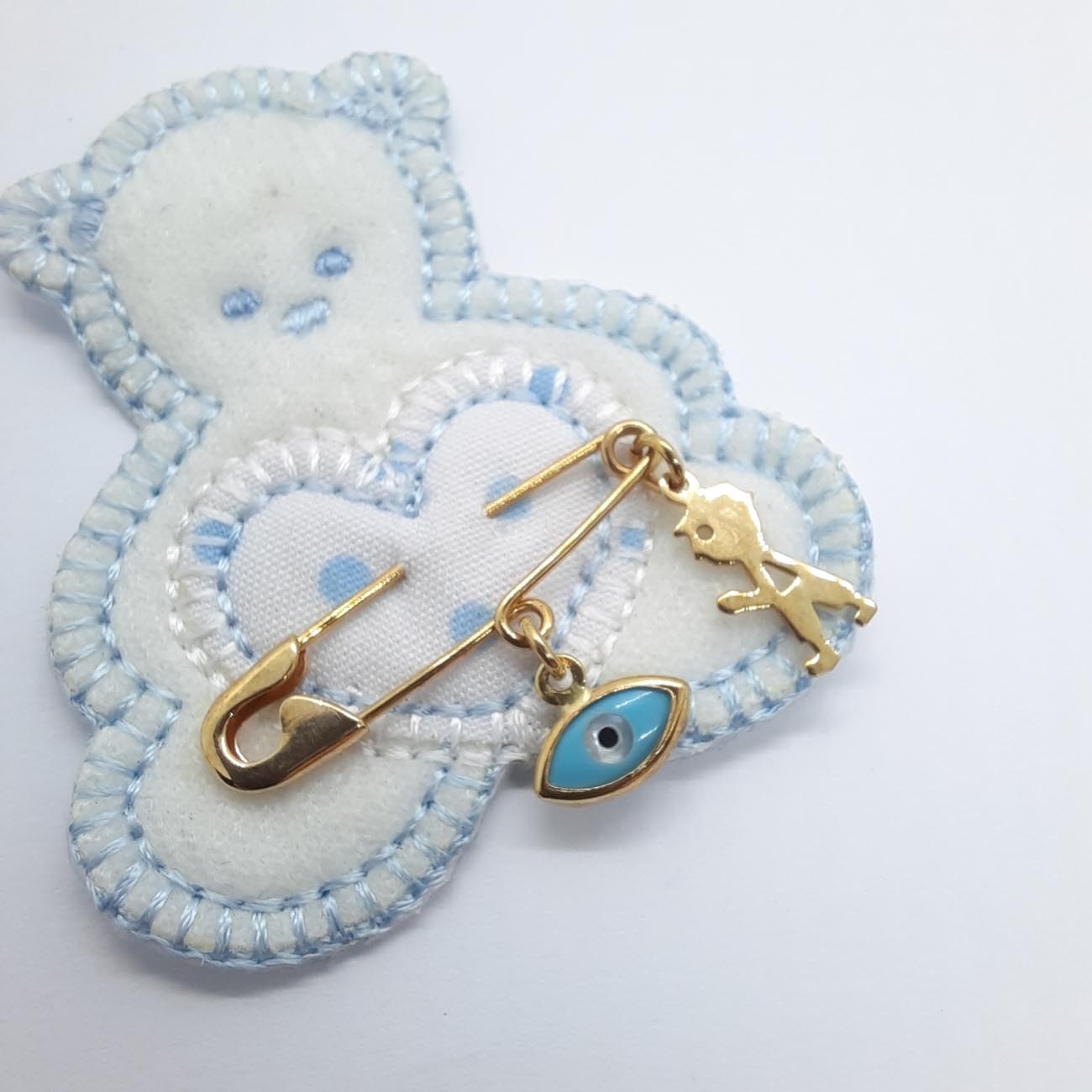 Χρυσό φυλακτό ματόχαντρο και φιγούρα αγοριού Κ9