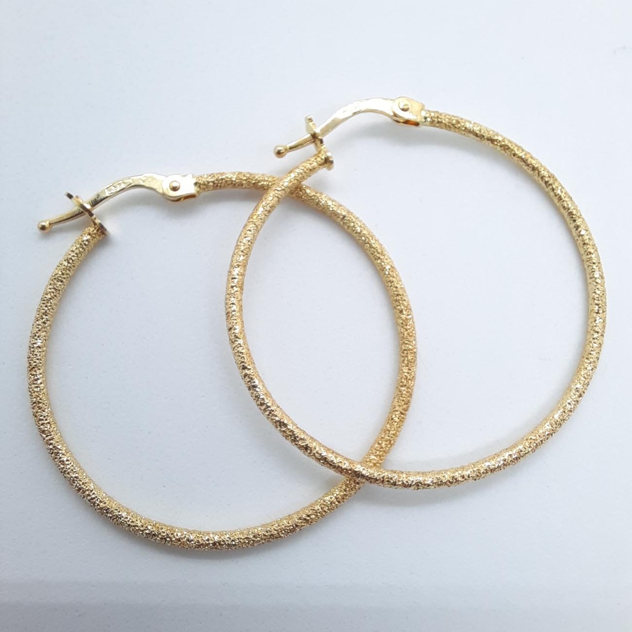 Χρυσοί κρίκοι ζαγρέ επιφάνεια Κ14