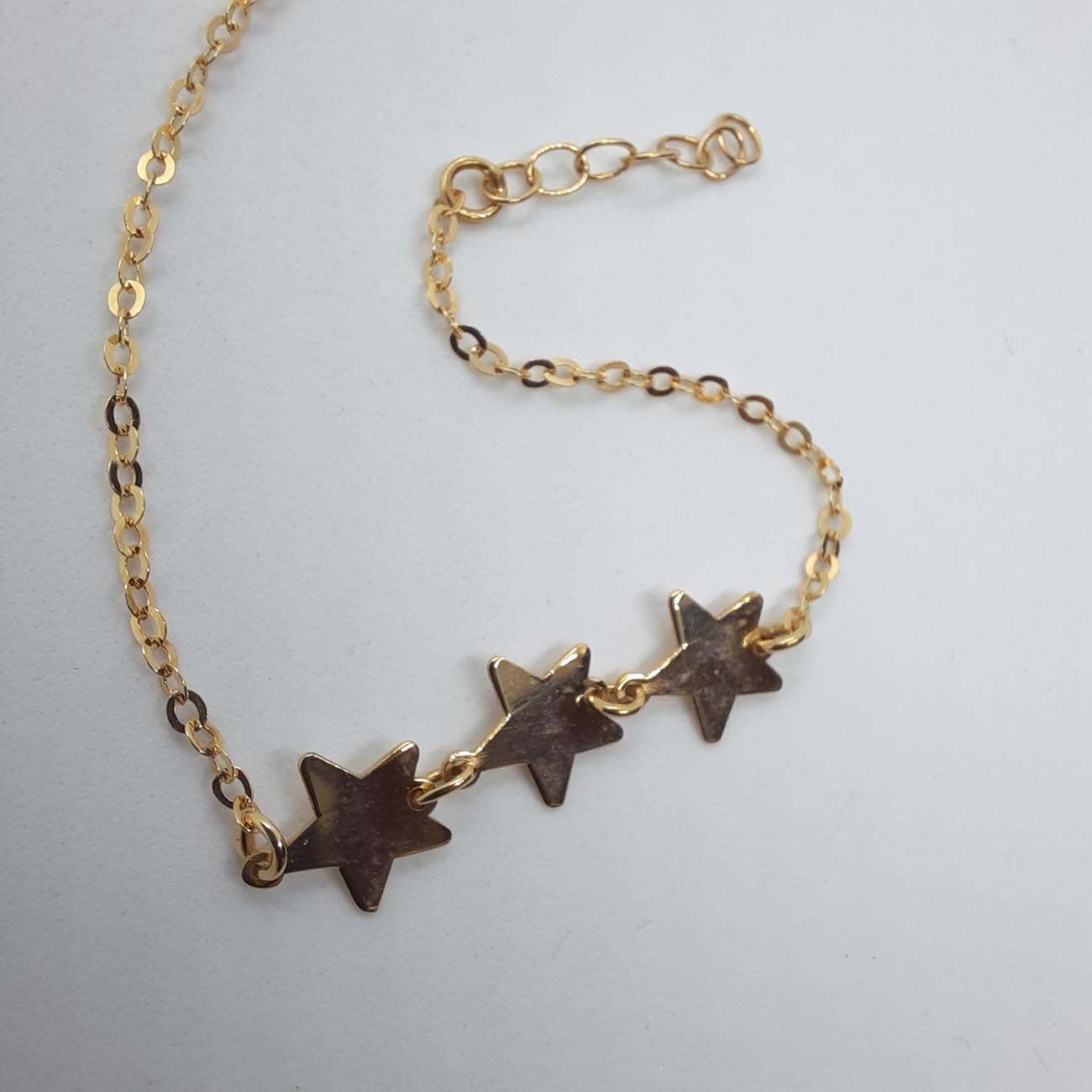 Χρυσό βραχιόλι Κ9 με αστέρια