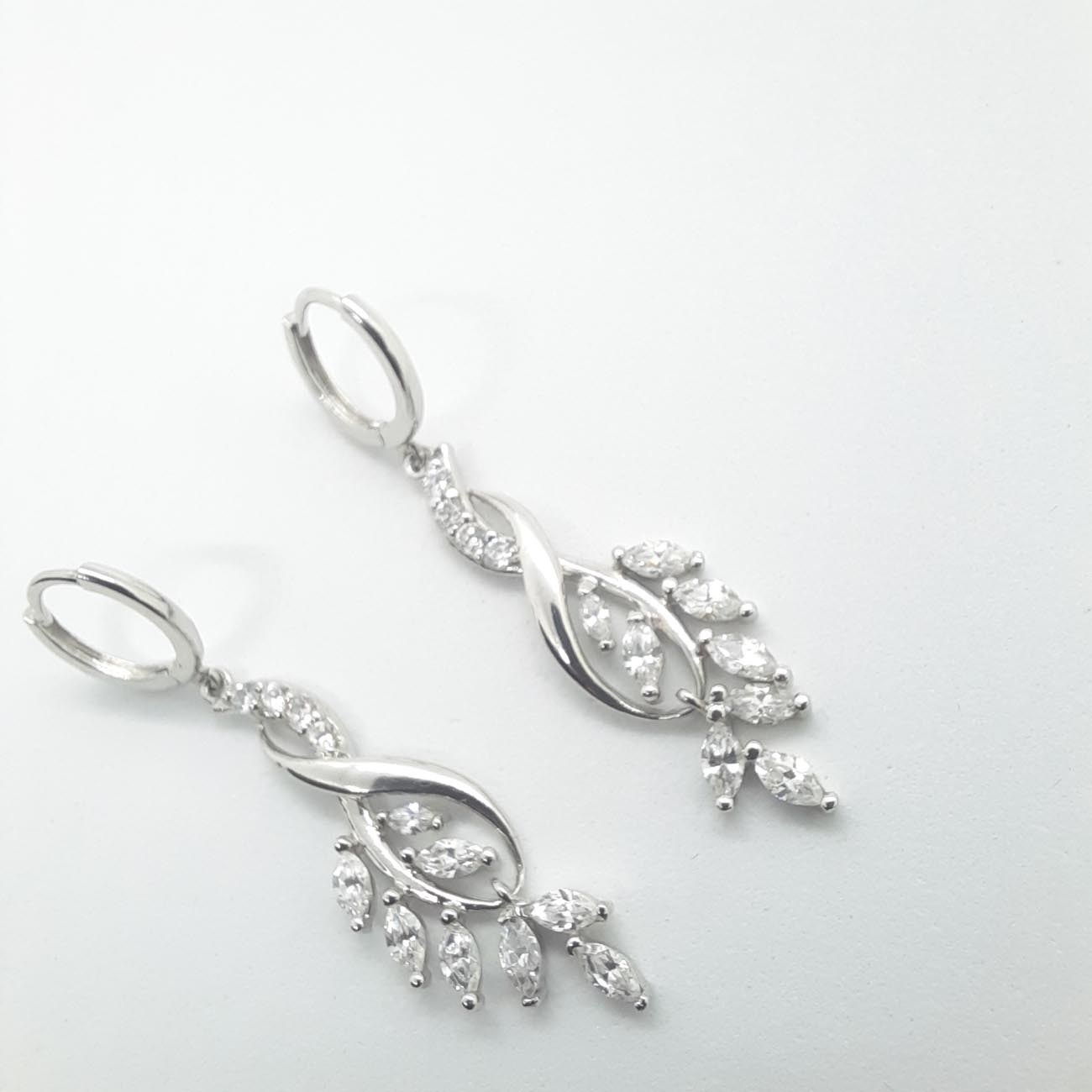 Χρυσά σκουλαρίκια ζιργκόν