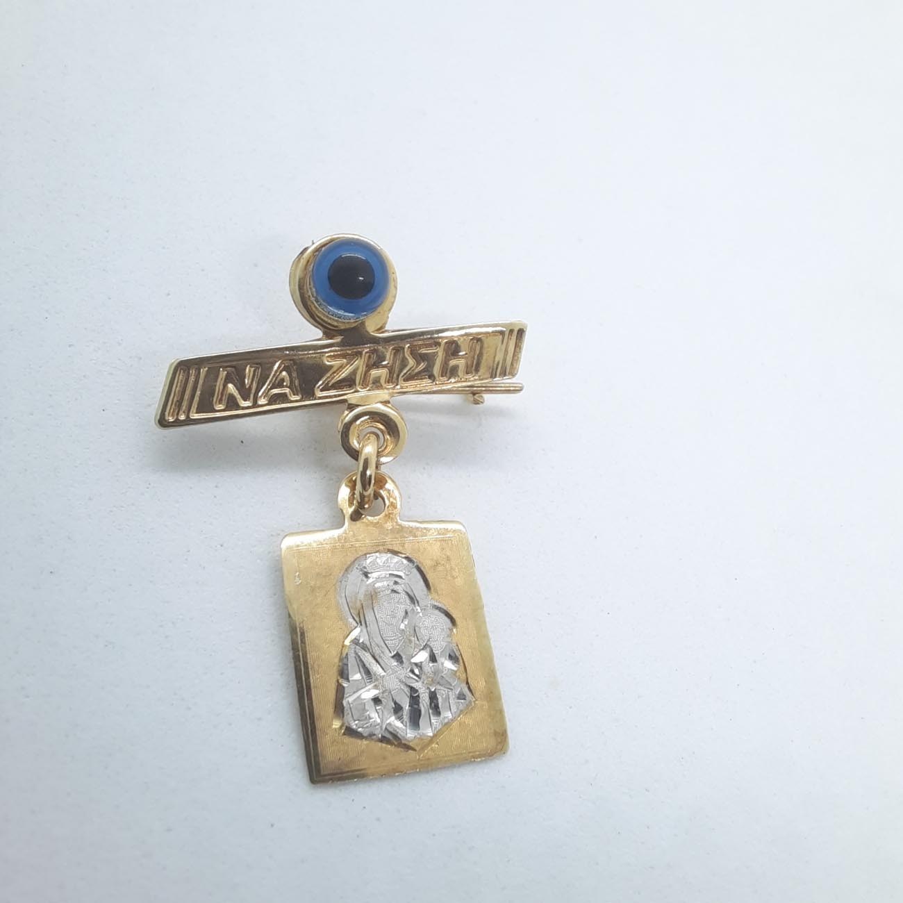 Χρυσό ματόχαντρο Κ9