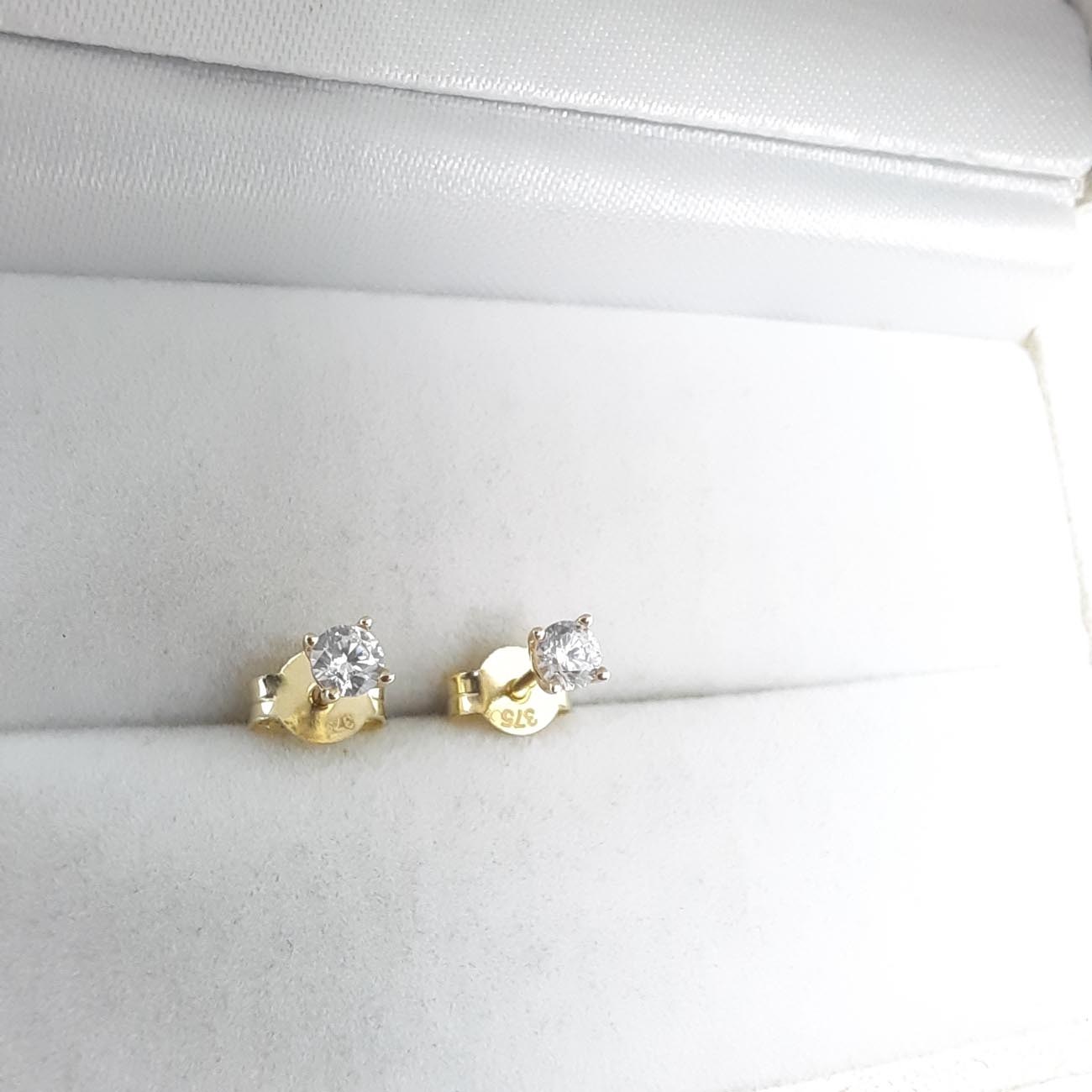 Σκουλαρίκια χρυσά λευκό ζιργκόν