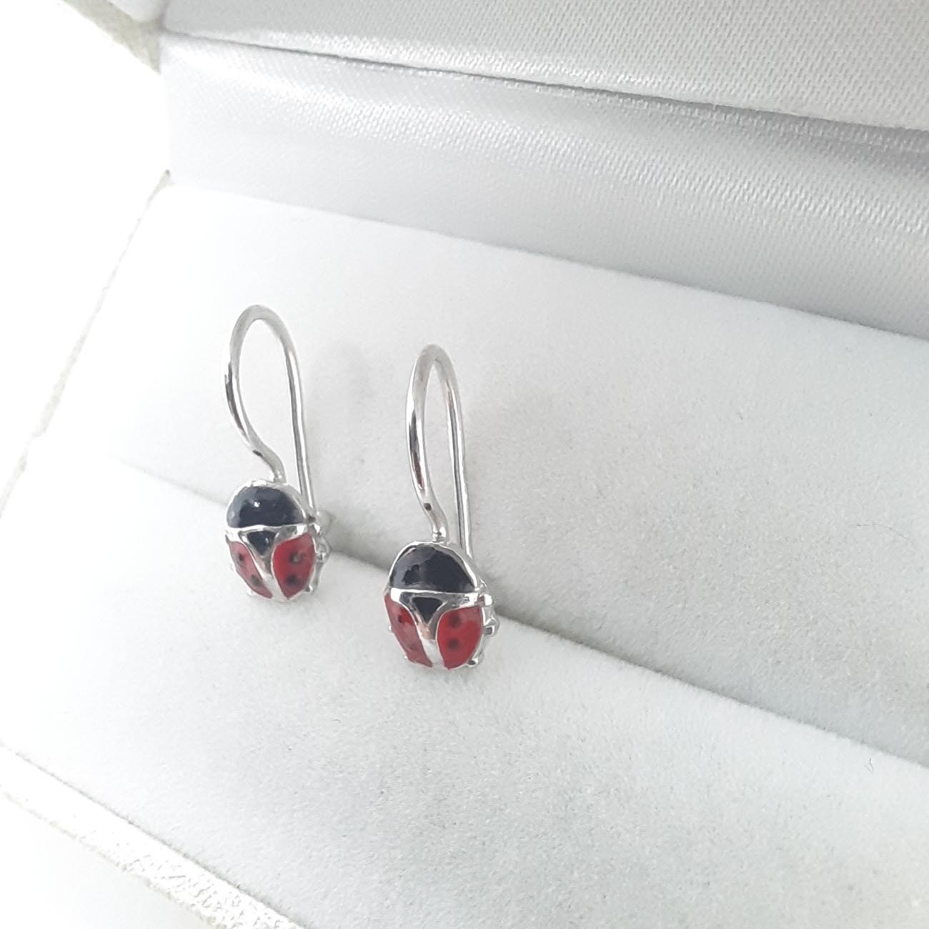 Πασχαλίτσες σκουλαρίκια μακριά από ασήμι 