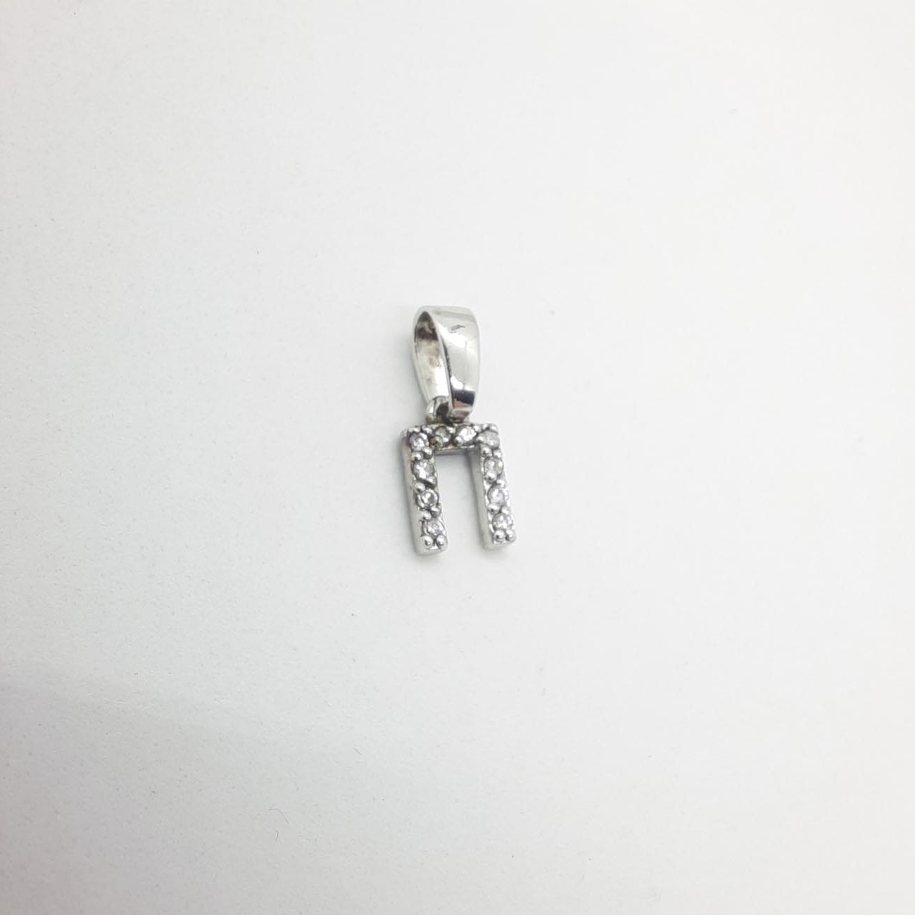 Ασημένιο μονόγραμμα πι με ζιργκόν