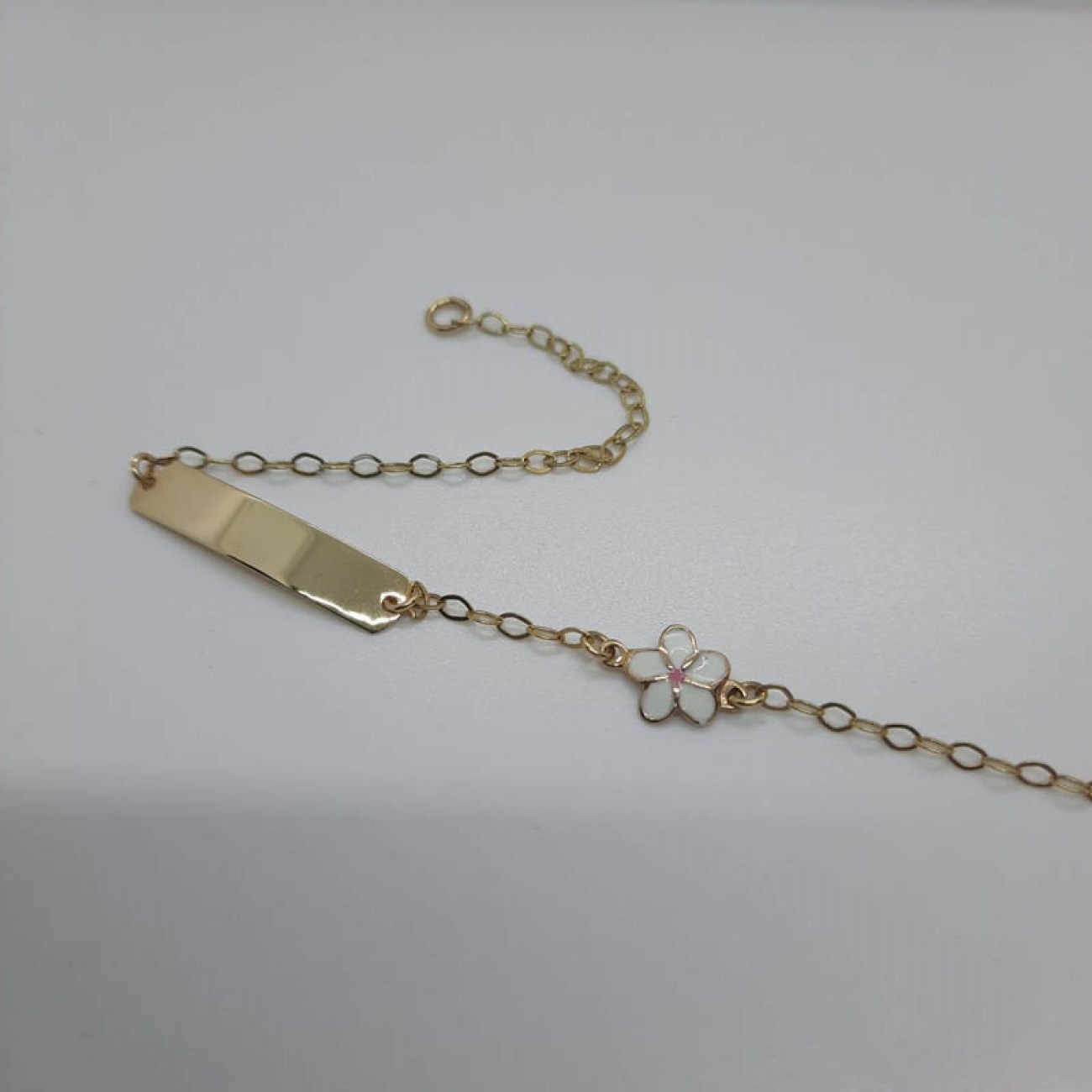 Χρυσή ταυτότητα με μαργαρίτα