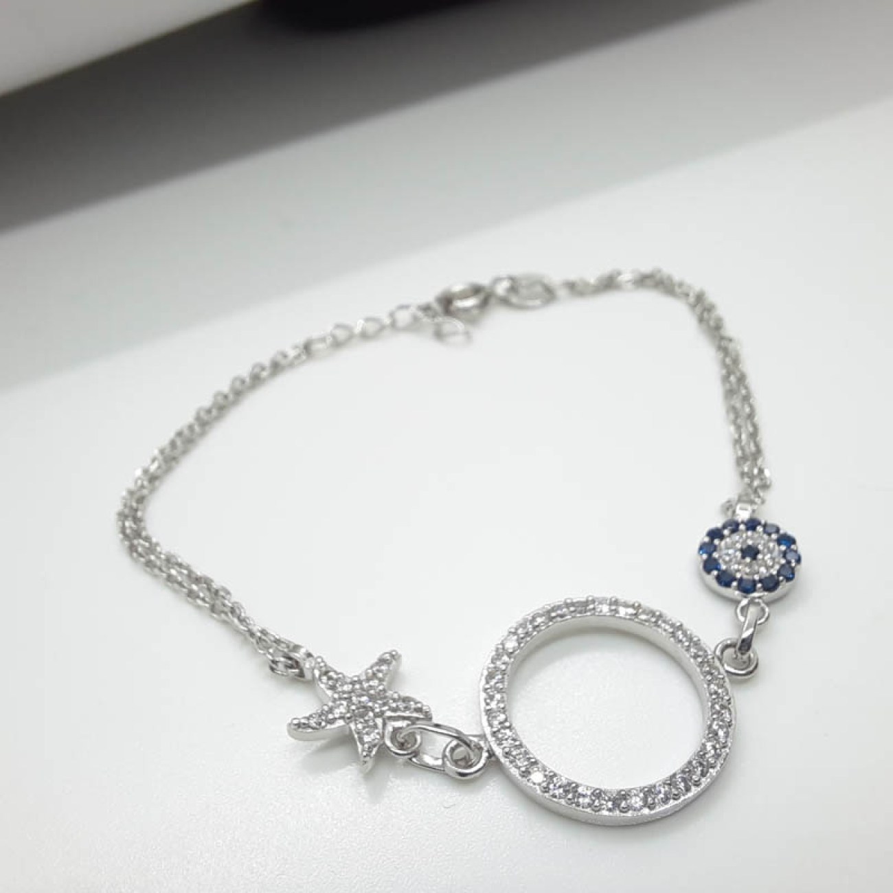 Βραχιόλι κρίκος-ματάκι-αστερίας 