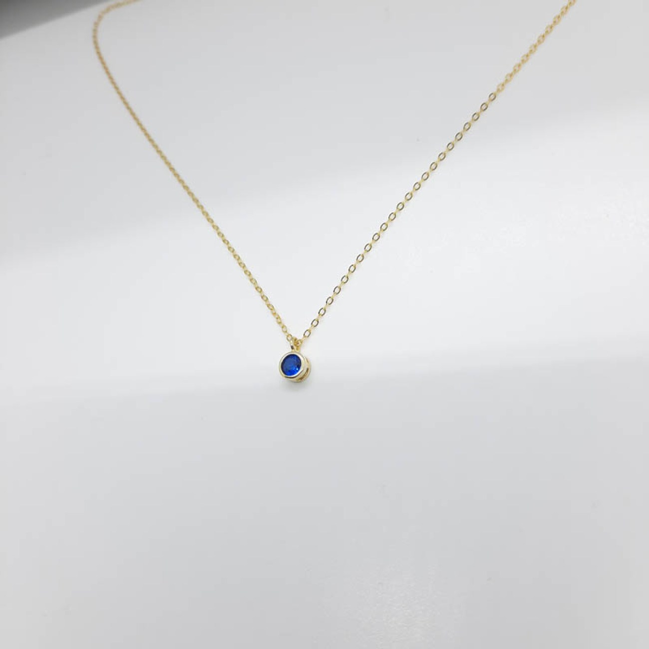 Κολιέ επίχρυσο μπλε ζιργκόν