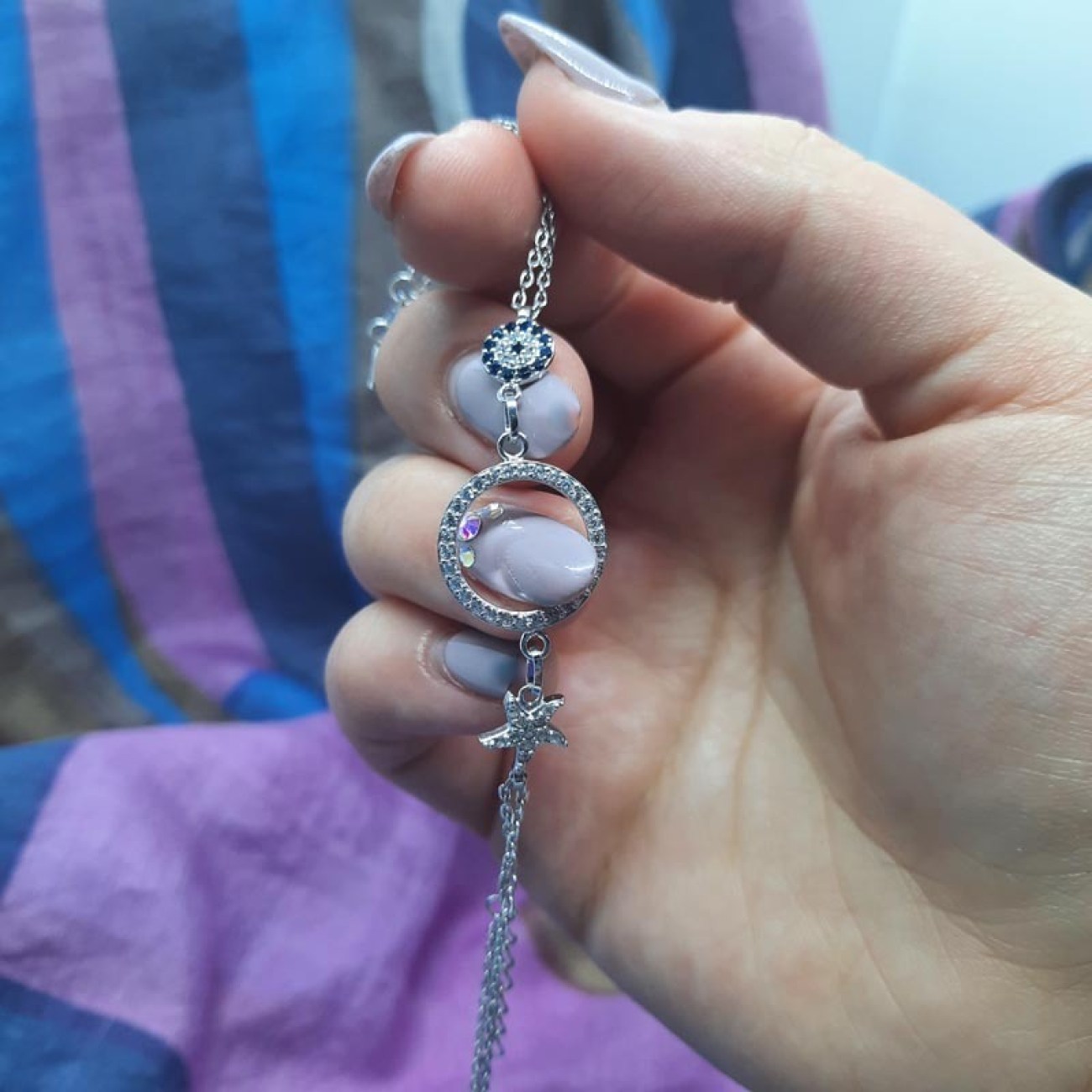 Βραχιόλι κρίκος-ματάκι-αστερίας 