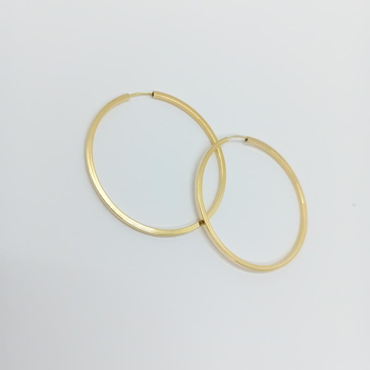 Χρυσοί πλακέ λεπτοί κρίκοι Κ14