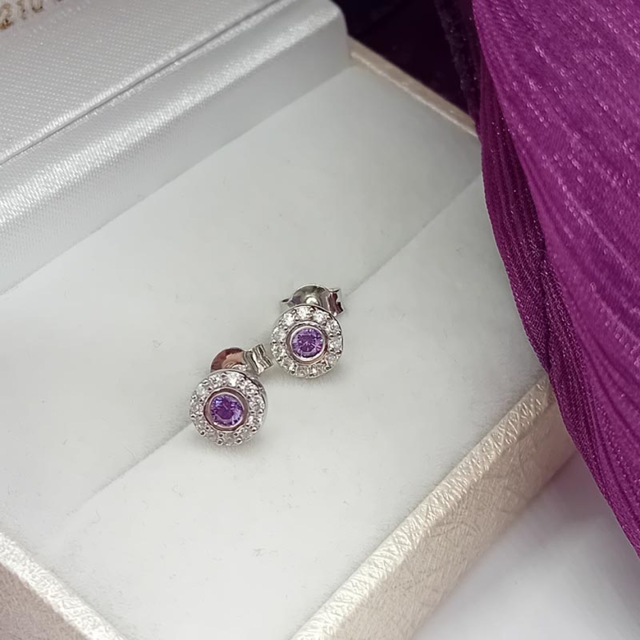 Σκουλαρίκια ασήμι στρογγυλά μωβ ζιργκόν