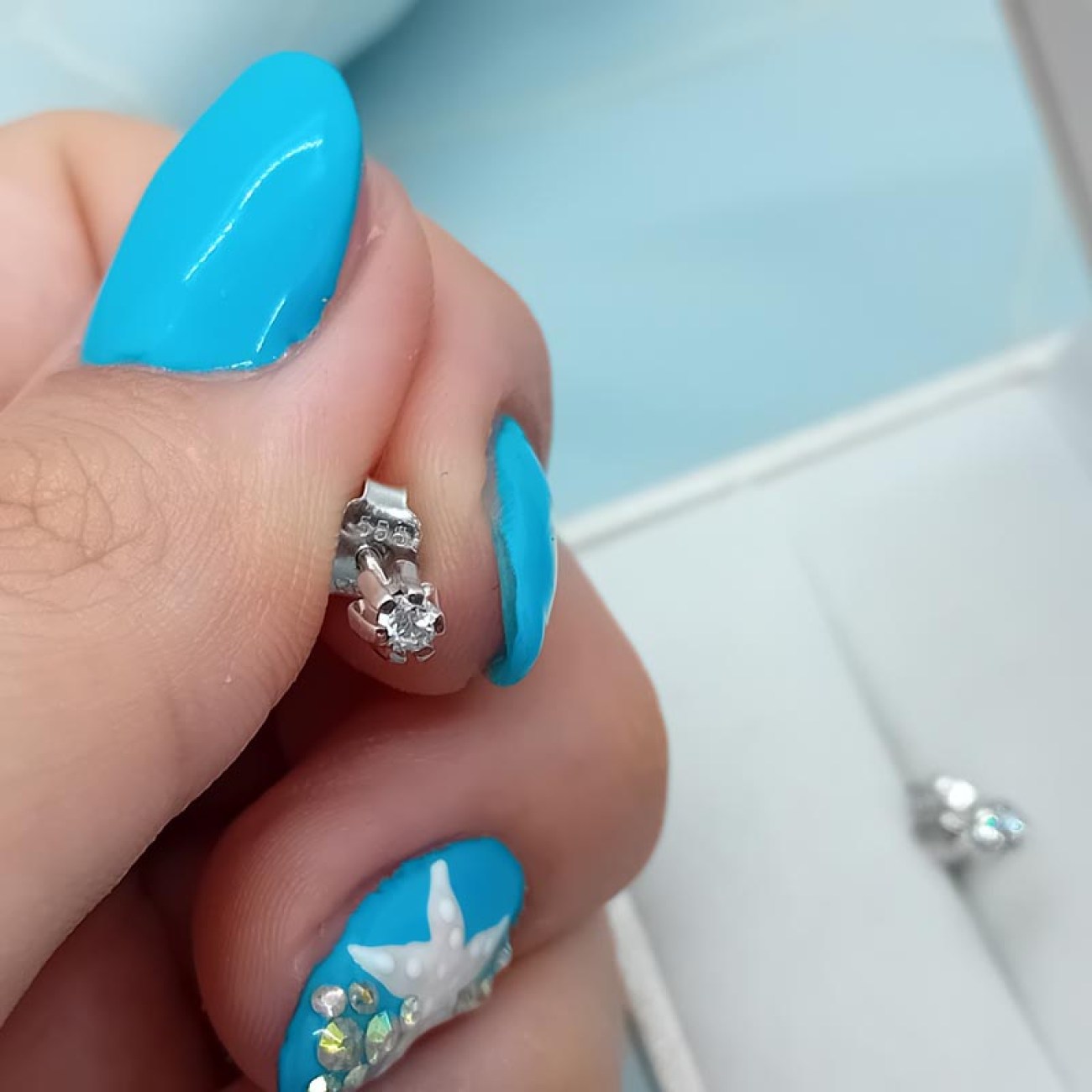 Σκουλαρίκια λευκόχρυσα Κ14 ζιργκόν