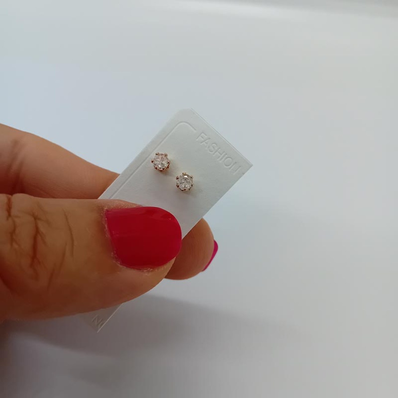 Σκουλαρίκια μονόπετρα λευκά ζιργκόν 