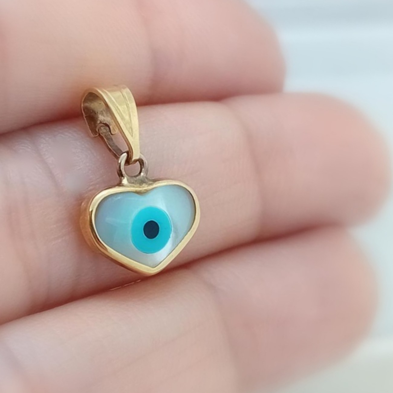 Χρυσή καρδιά με ματάκι Κ14