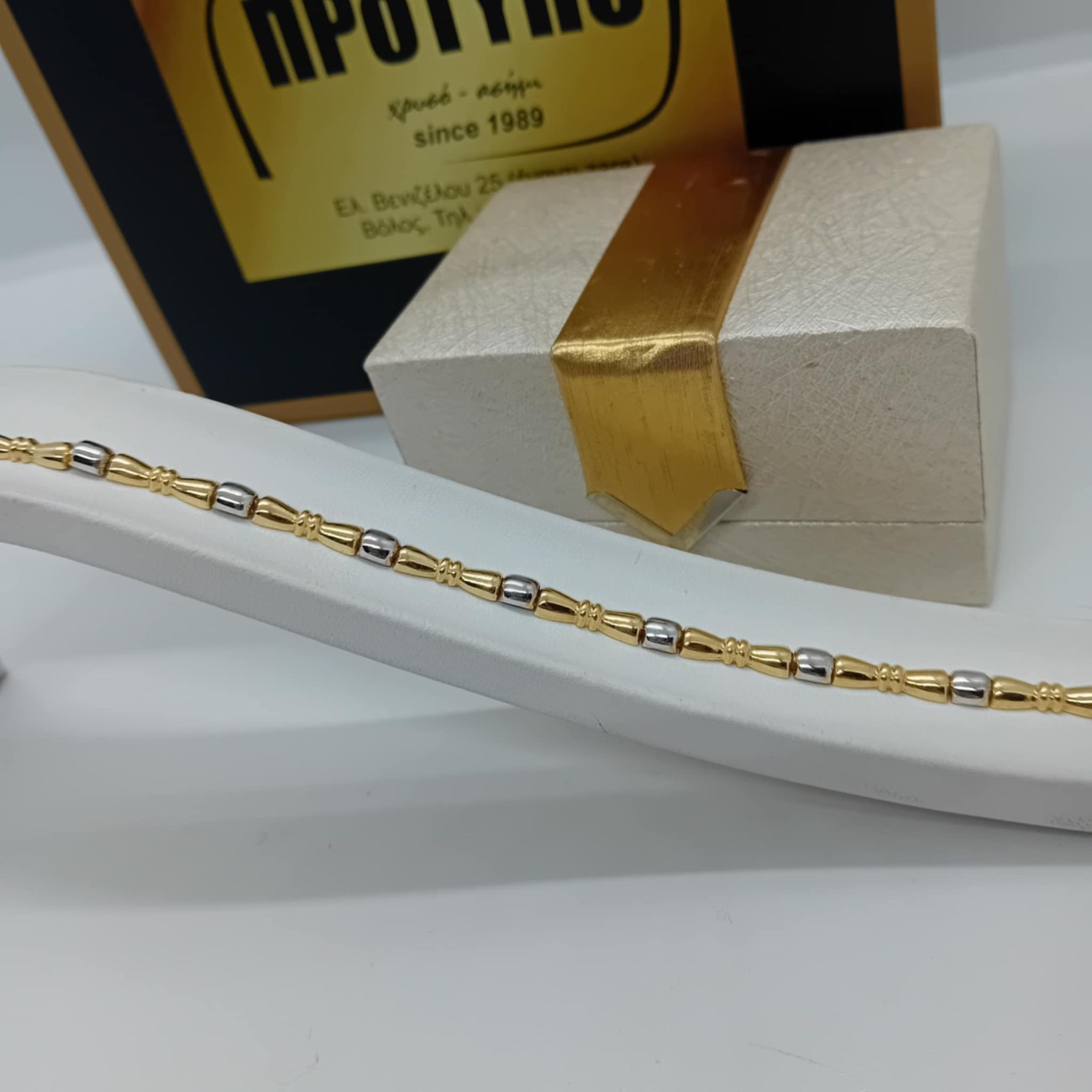 Χρυσό και λευκόχρυσο βραχιόλι σπαστή χειροπέδα Κ14 