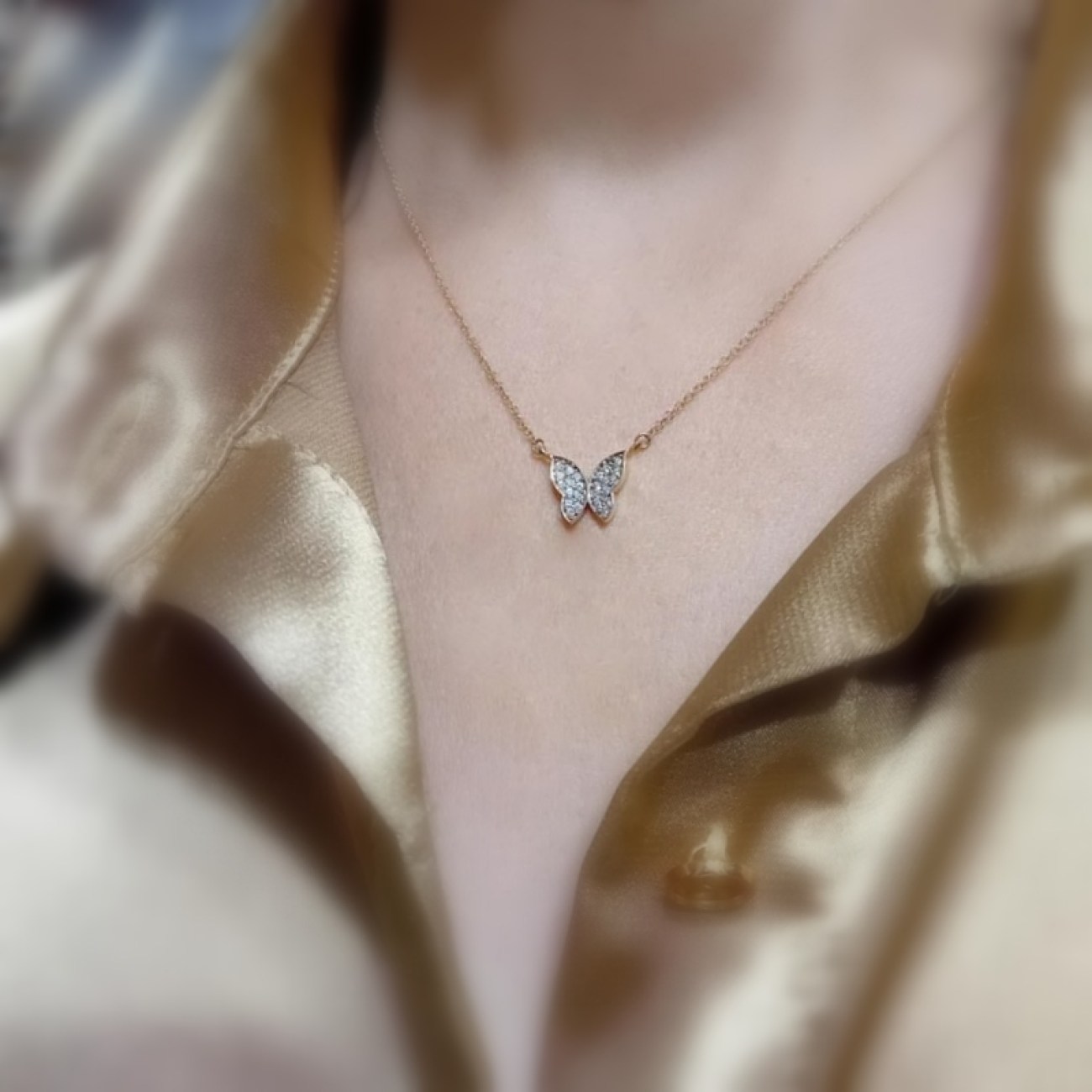 Χρυσό κολιέ Κ14 πεταλούδα ζιργκόν
