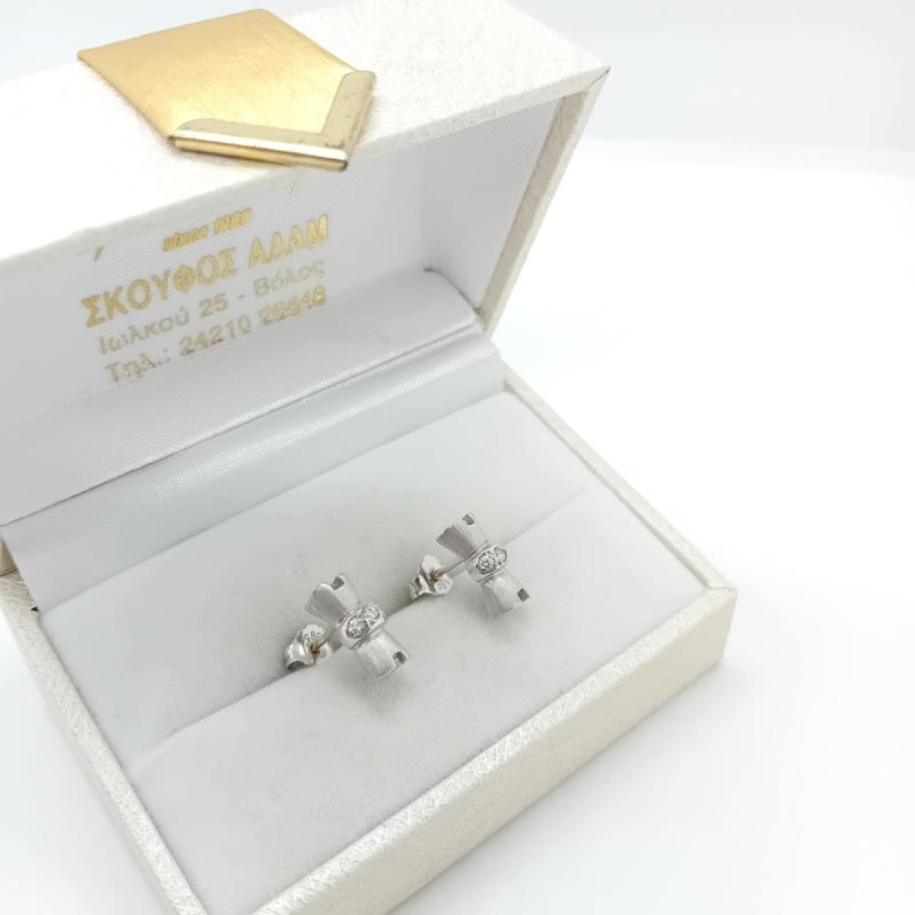 Σκουλαρίκια λευκόχρυσα Κ14 "φιόγκοι"